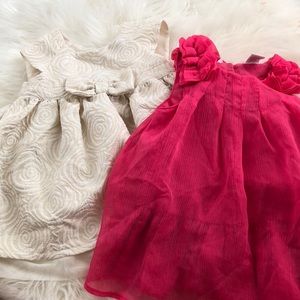 Pink dress 12 months brown dress is 3-6 months